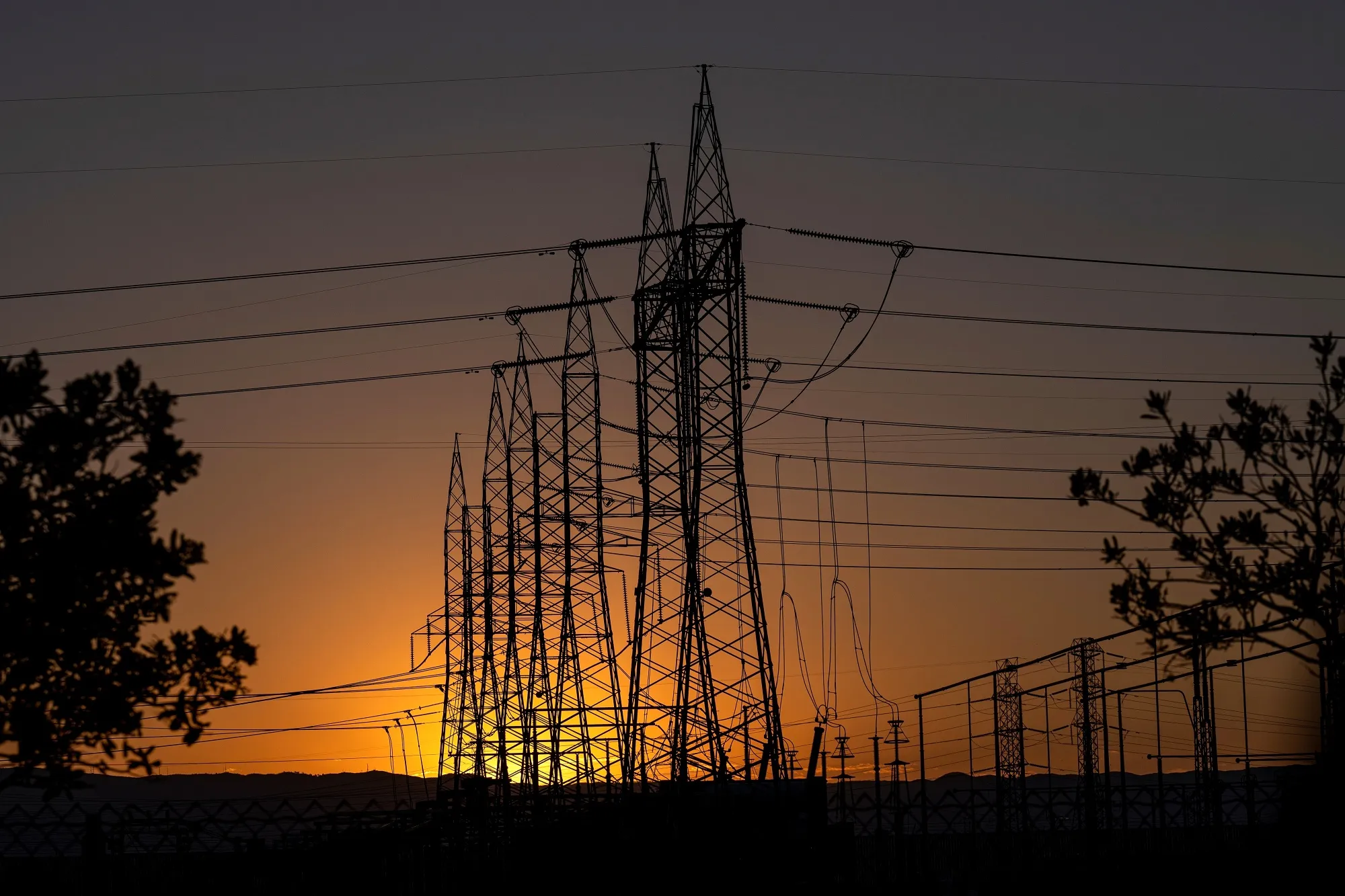 Transmission towers at a Pacific Gas and Electric (PG&amp;E) electrical substation in California.