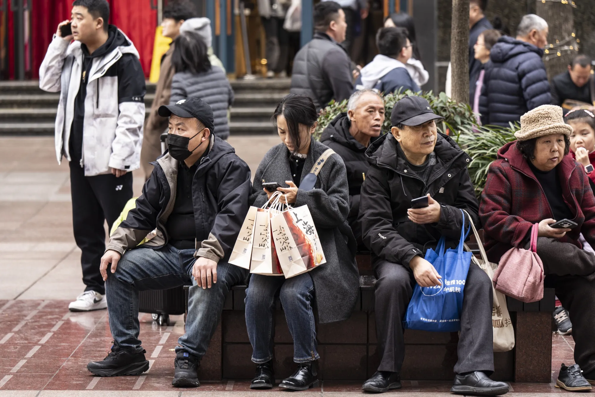 Shoppers in the Nanjing East Road retail area in Shanghai during the Lunar New Year holidays.