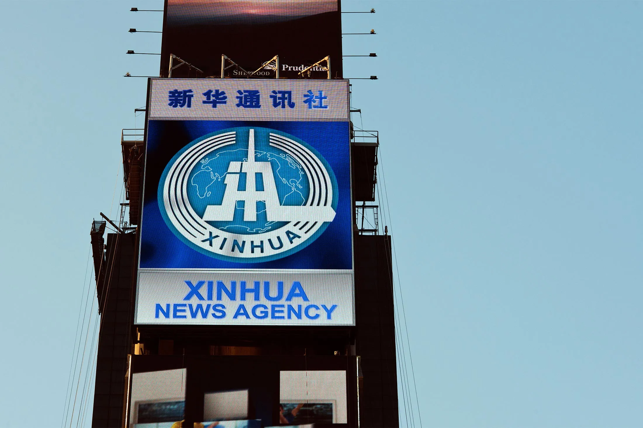 The Chinese news agency Xinhua promotes its United States presence with a giant illuminated billboard on 2 Times Square in New York, seen on Aug. 2, 2011.