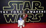 Robots R2-D2 and C-3P0 attend the opening of the European Premiere of 'Star Wars: The Force Awakens' in London, on Dec. 16, 2015.
