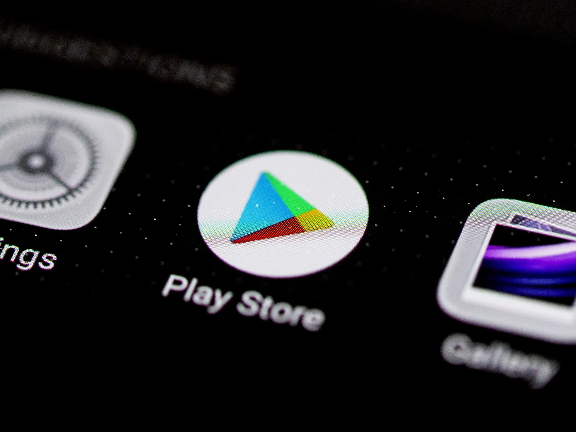 The icon for Google LLC's Play Store application, center, is displayed on a Huawei Technologies Co. P20 Pro smartphone in an arranged photograph taken in Hong Kong, China, on Monday, May 20, 2019. Top U.S. corporations from chipmakers toGooglehave frozen the supply of critical software and components toHuawei, complying with aTrumpadministrationcrackdownthat threatens to choke off China's largest technology company.