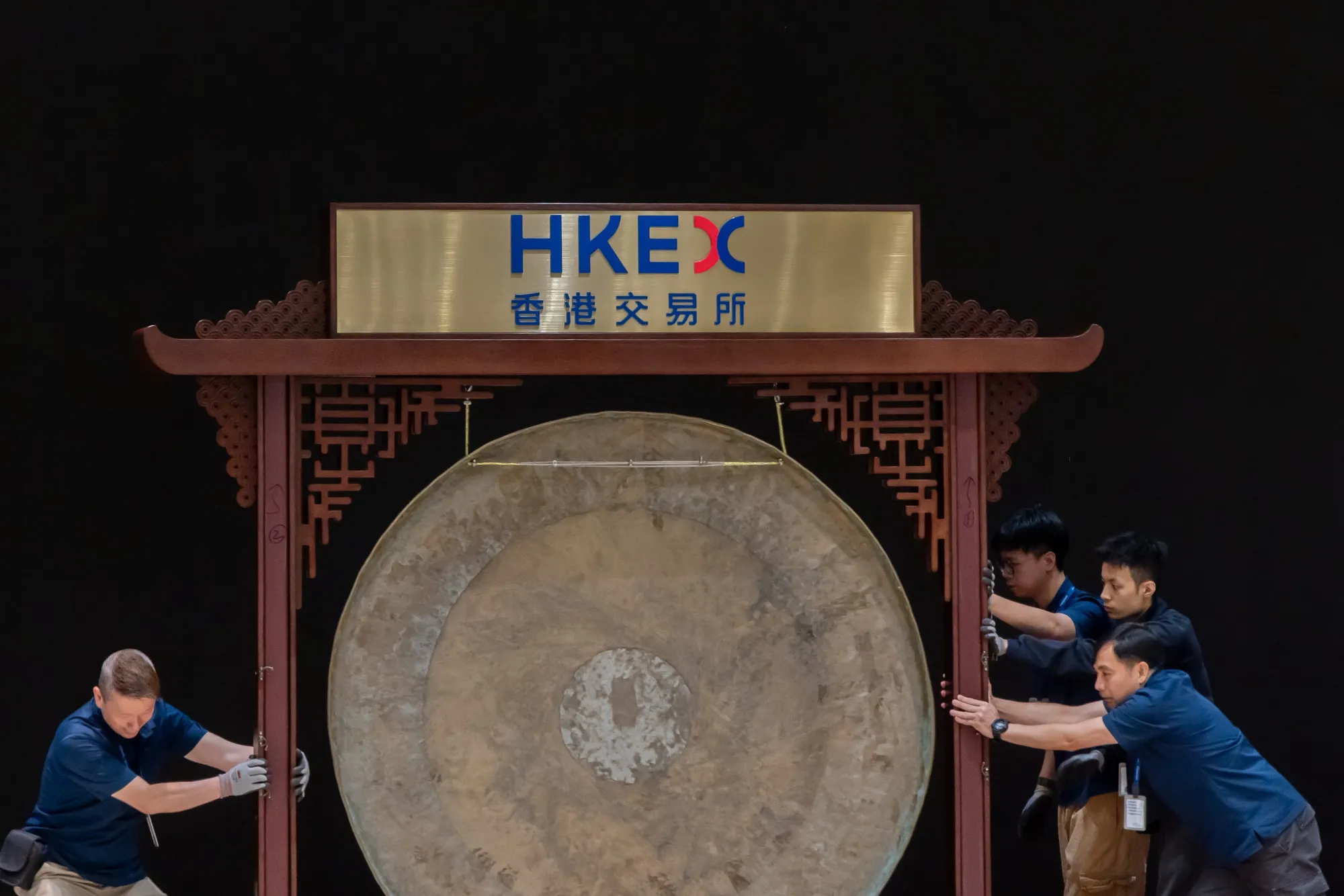 Workers prepare for an IPO at the Hong Kong Stock Exchange.