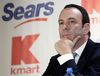 In this Nov. 17, 2004, file photo, Kmart Chairman Edward Lampert listens during a news conference announcing the merger of Kmart and Sears in New York.