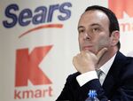 In this Nov. 17, 2004, file photo, Kmart Chairman Edward Lampert listens during a news conference announcing the merger of Kmart and Sears in New York.