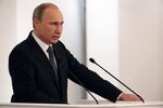 Russian President Vladimir Putin delivers his annual state of the nation address to the National Assembly in Grand Kremlin Palace on Dec. 4 in Moscow