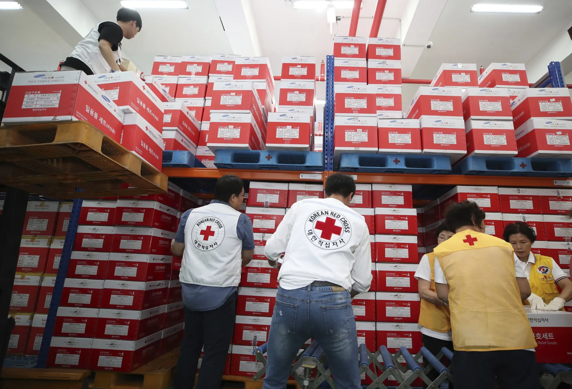 Korea Red Cross workers prepares aid supply kits as Typhoon Lingling approaches to Korean peninsular in Seoul on&nbsp;Sept. 6.