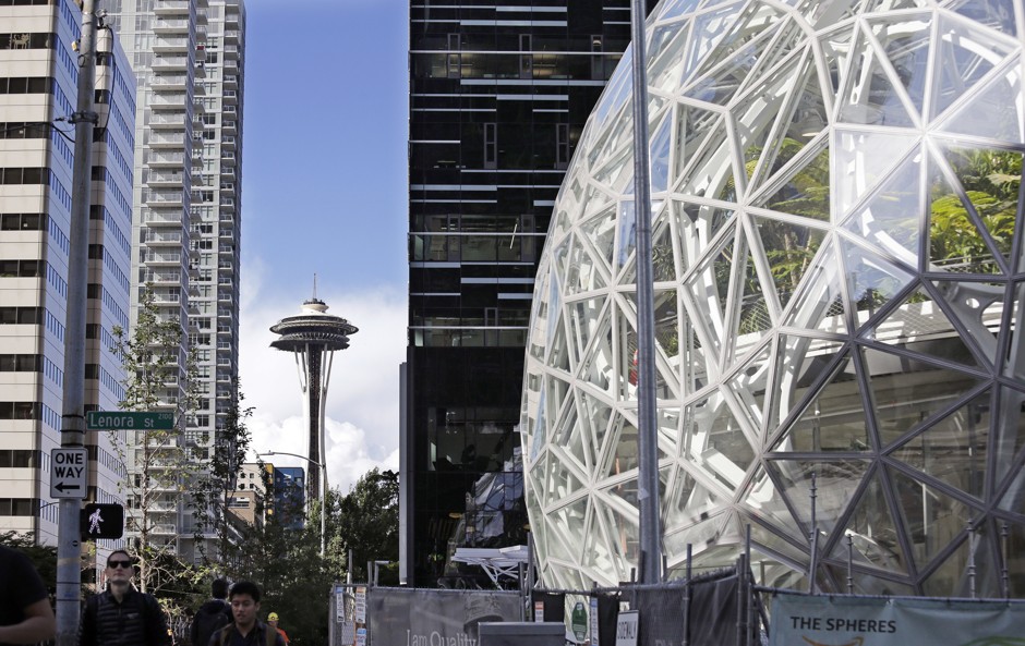 New investments surrounding an Amazon headquarters could drive up housing costs, displace low-income families, strain the transportation network, and widen the gap between rich and poor residents, if Seattle's experience is any guide.