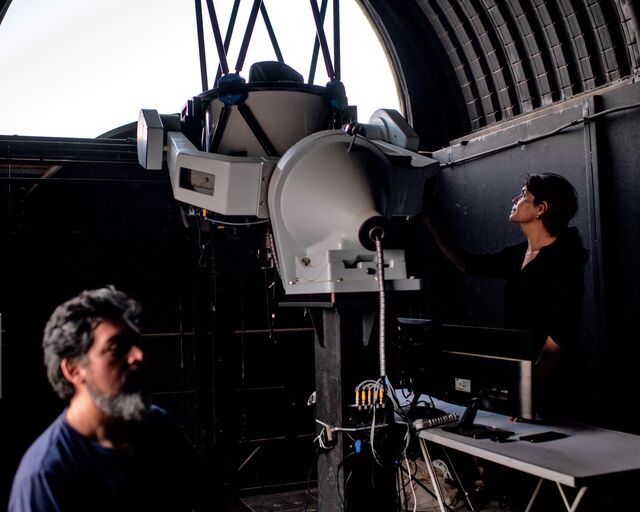 Eduardo Unda-Sanzana (right) and colleague Juan Pablo Colque at the Ckoirama Observatory.