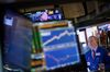 A trader works on the floor of the New York Stock Exchange (NYSE) in New York, U.S..