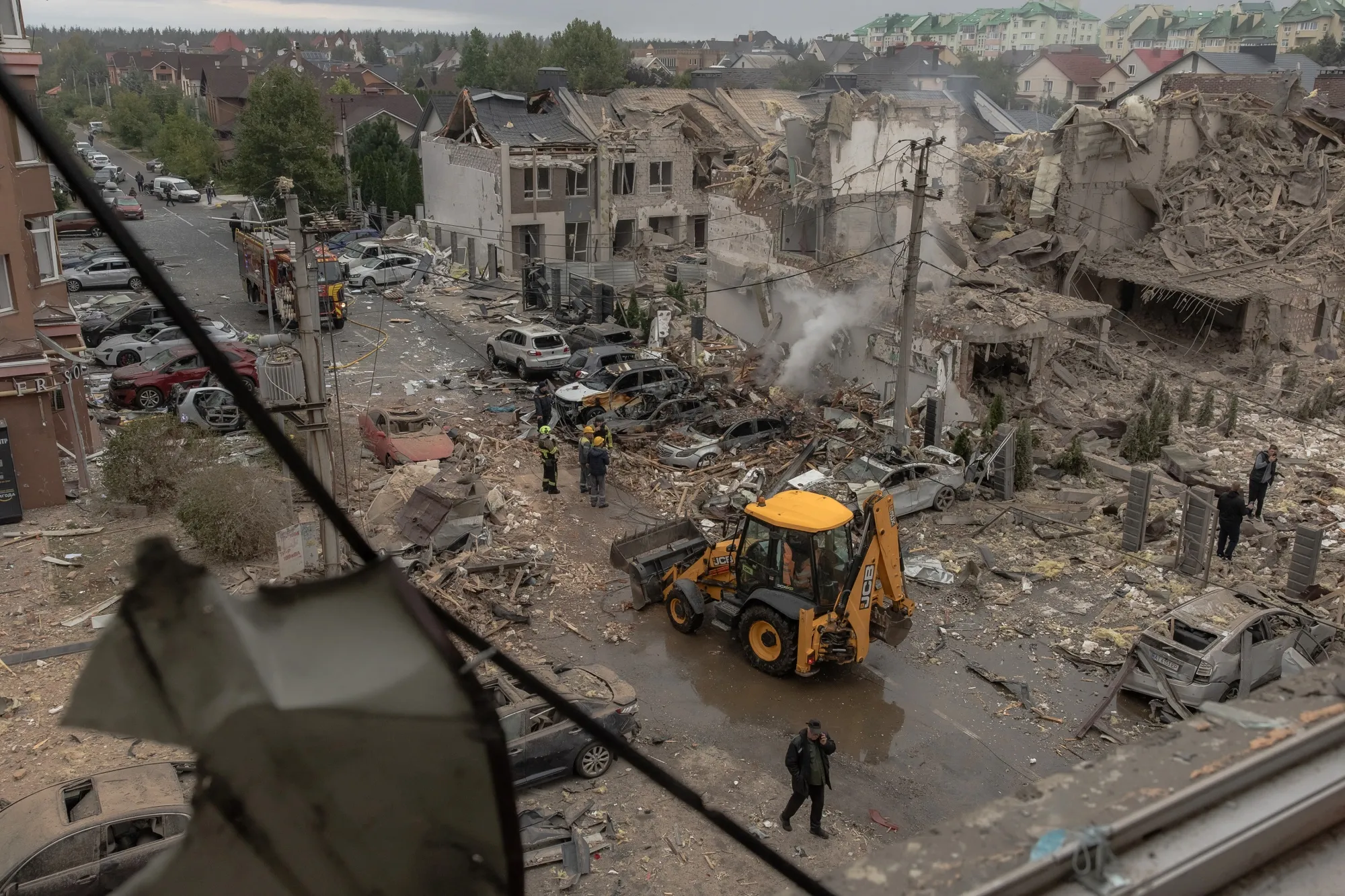 Heavily damaged residential buildings following a Russian air strike on the outskirts of Kyiv, on Sept. 28.