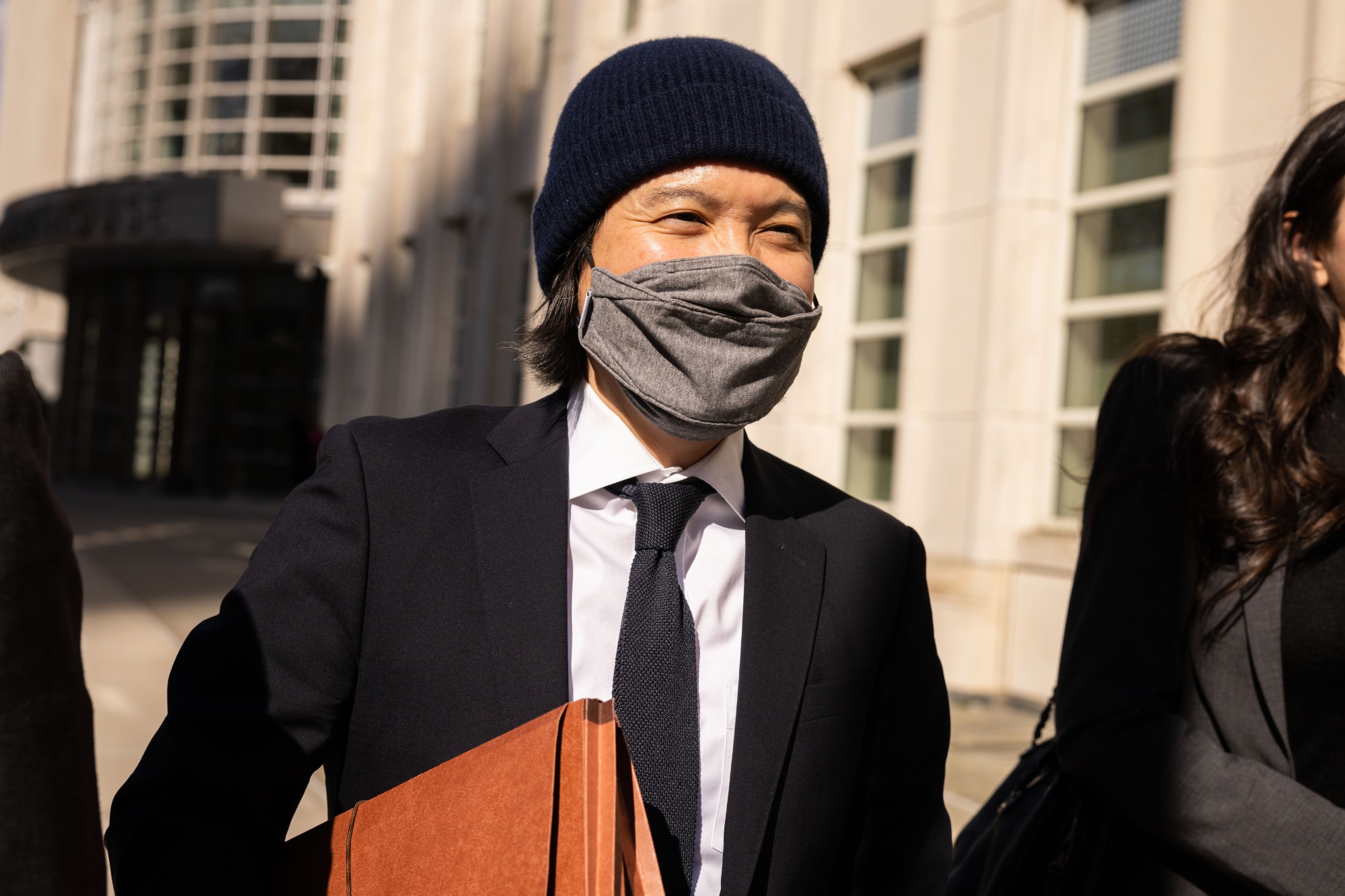 Roger Ng&nbsp;departs federal court in the Brooklyn borough of New York, on March 9.