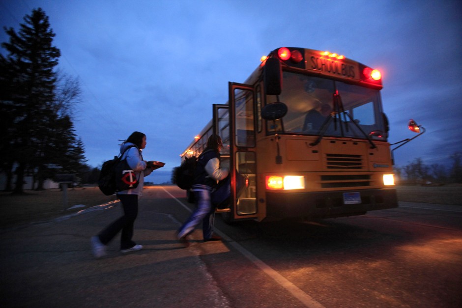 Buses may pick students up before sunrise because of early school start times. 