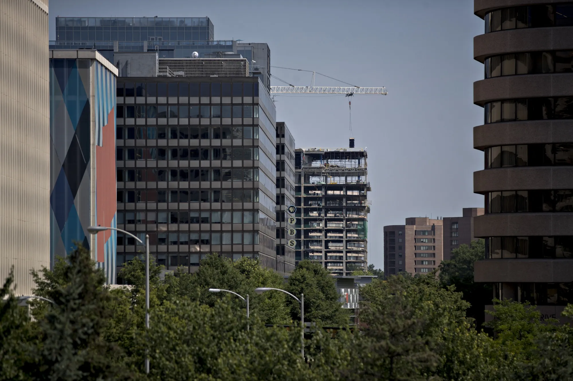 The 1750 Crystal Drive building, center, stands while being "reskinned" during renovation in the Crystal City neighborhood of Arlington, Virginia.