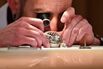 Geneva, Switzerland. 1st Apr, 2025. A craftsman demonstrates watch restoration craftsmanship at Watches and Wonders Geneva 2025 at the Palexpo in Geneva, Switzerland, April 1, 2025. The 7-day event kicked off here on Tuesday, bringing together 60 particip