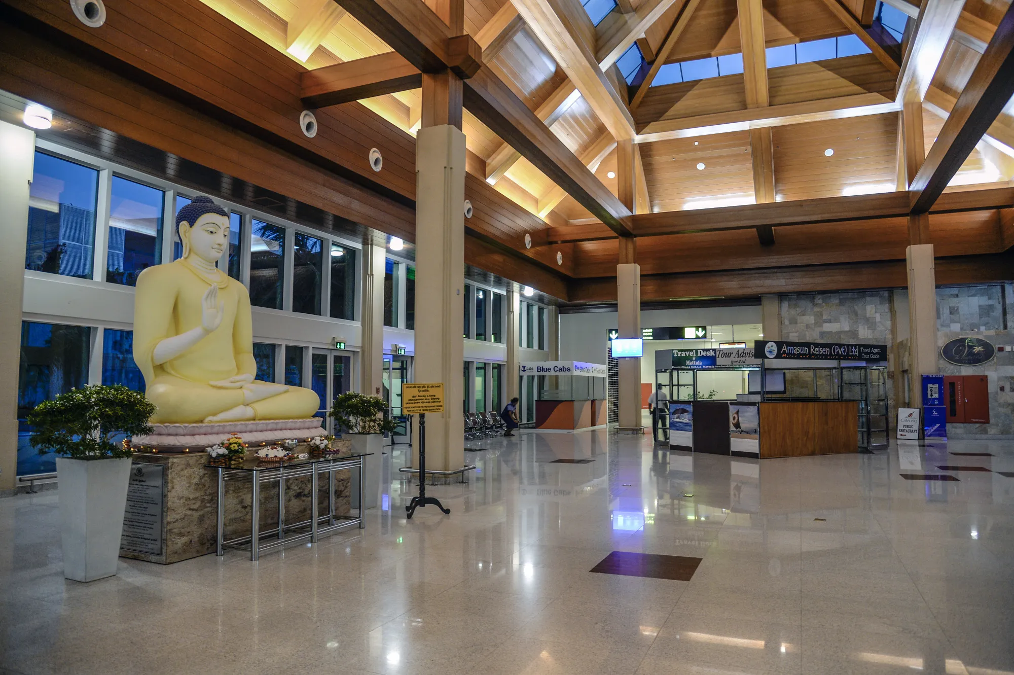 A Buddist statue of Guan Yin stands in an empty hall at Mattala Rajapaksa International Airport.