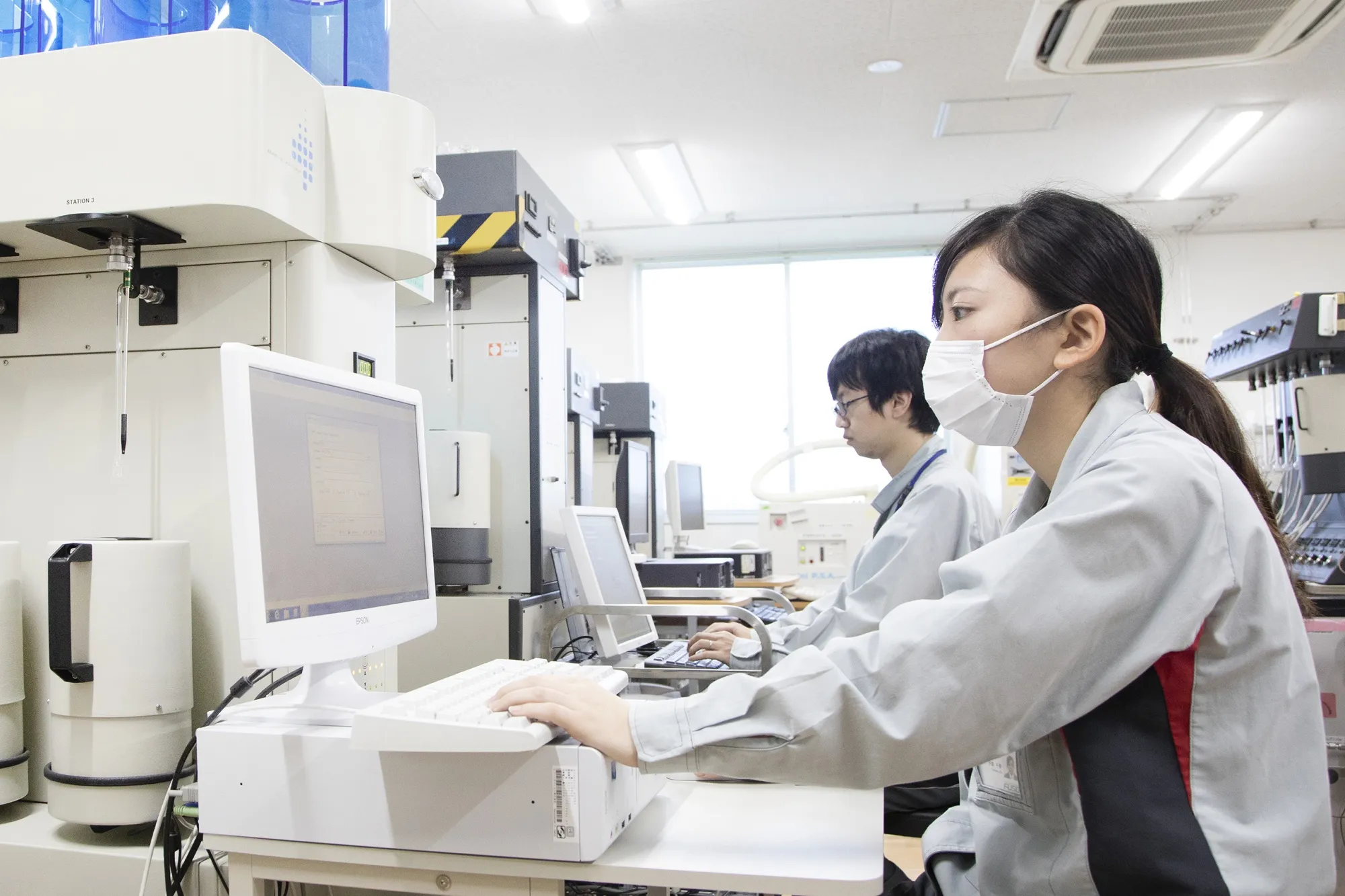 Fuso Chemical employees at the company’s Kyoto plant.