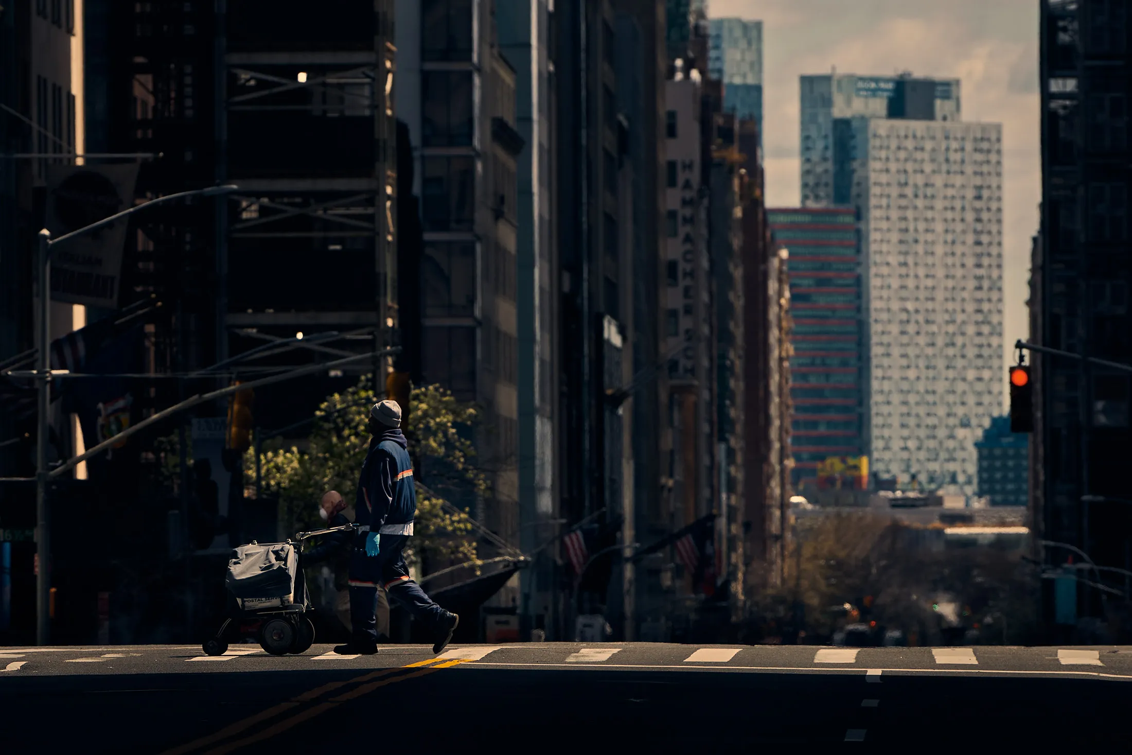 A mail carrier on his run in Midtown Manhattan on April 4.&nbsp;