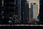 A mail carrier on his run in Midtown Manhattan on April 4.&nbsp;