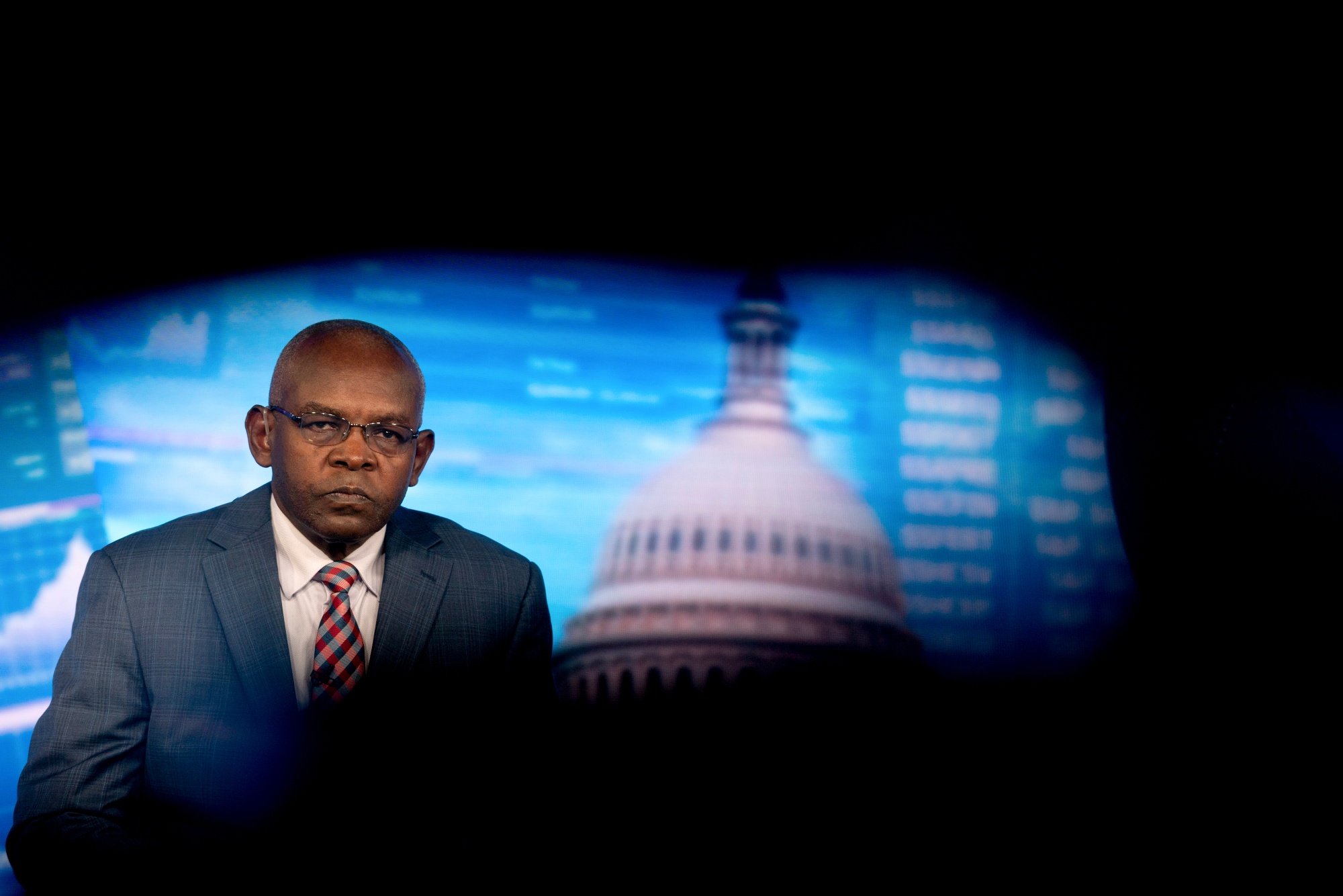 Dr. Kamau Thugge, governor of Kenya's central bank, during a Bloomberg Television interview in Washington, DC, US, on Thursday, April 24, 2025. The International Monetary Fund sharply lowered its forecasts for world growth for this year and next, warning the outlook could deteriorate further as US President Donald Trump's tariffs spark a global trade war. Photographer: Stefani Reynolds/Bloomberg