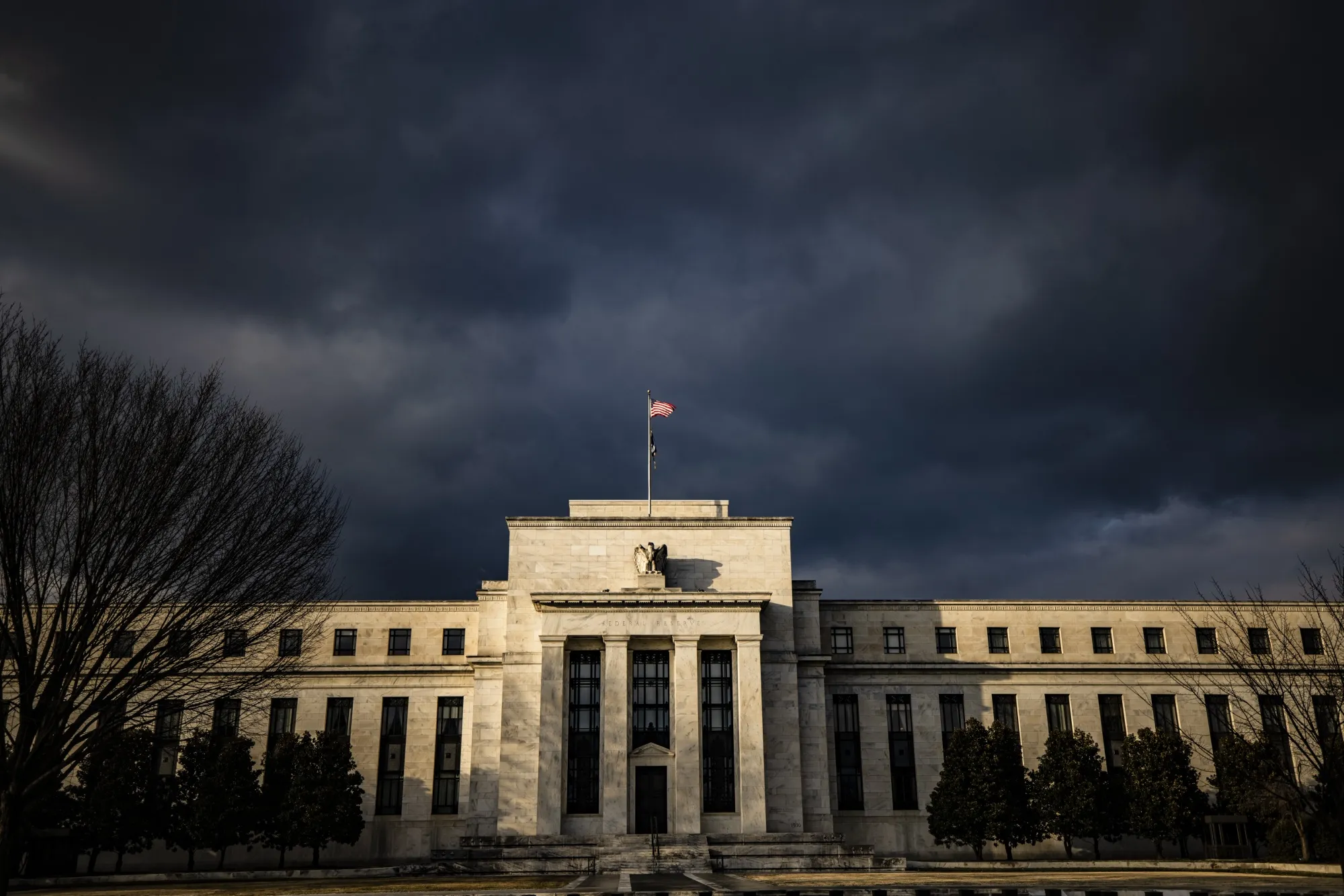 More than clouds are building over the Federal Reserve.