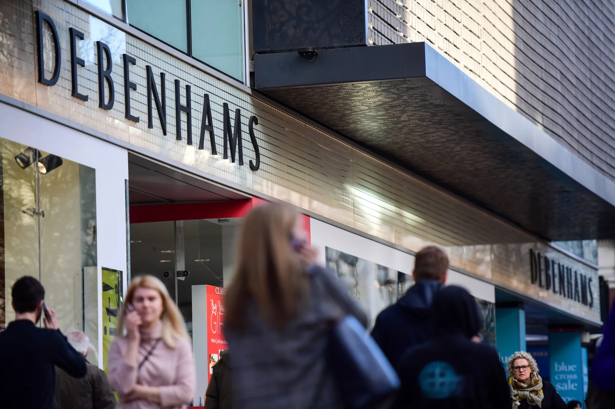 Pedestrians pass a Debenhams Plc department store in London, on&nbsp;Jan. 8.