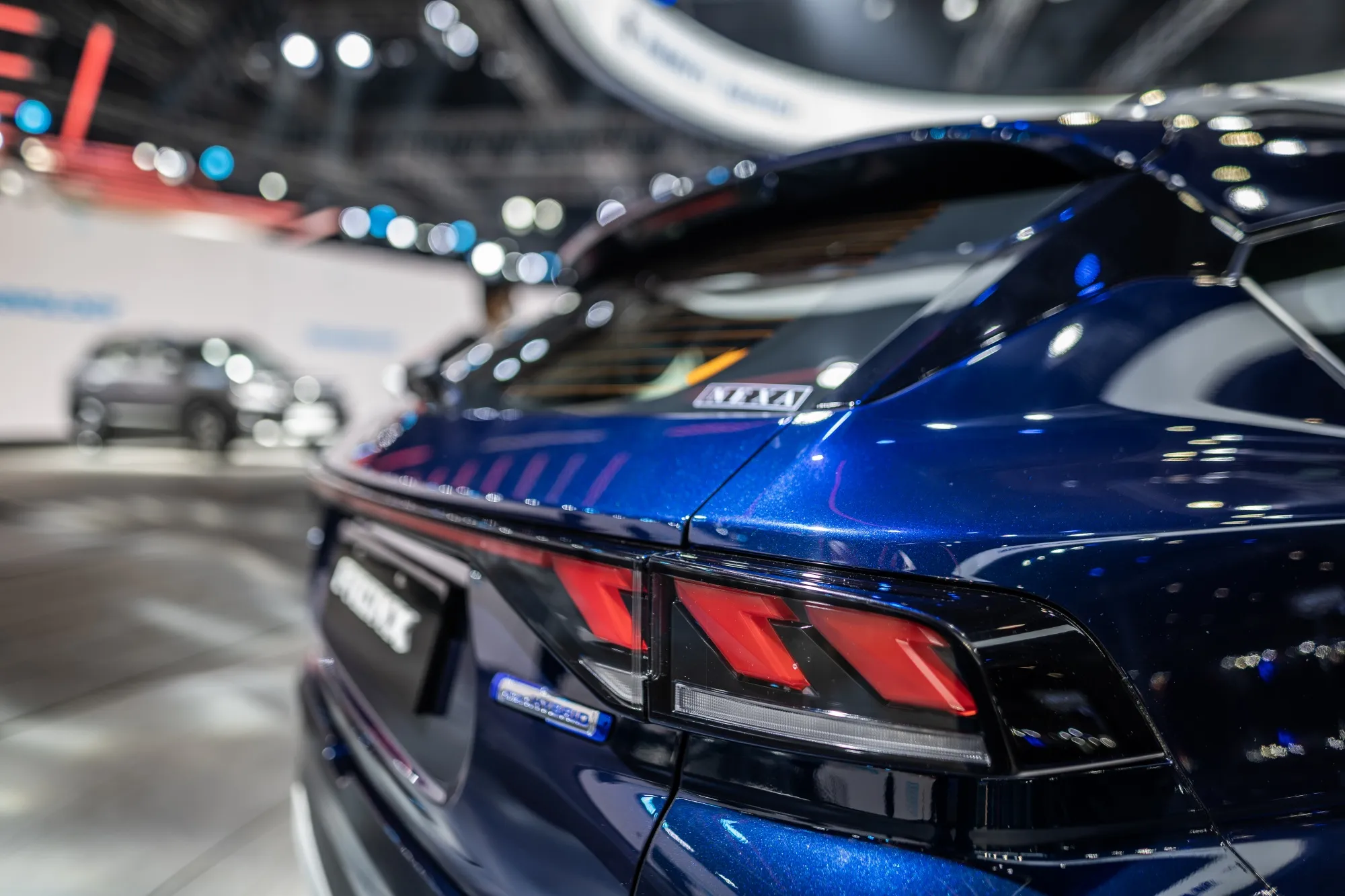The taillight of a Maruti Suzuki India Ltd. Fronx sport utility vehicle at the India Auto Expo 2023 in Noida, Uttar Pradesh, India, on Jan. 13.