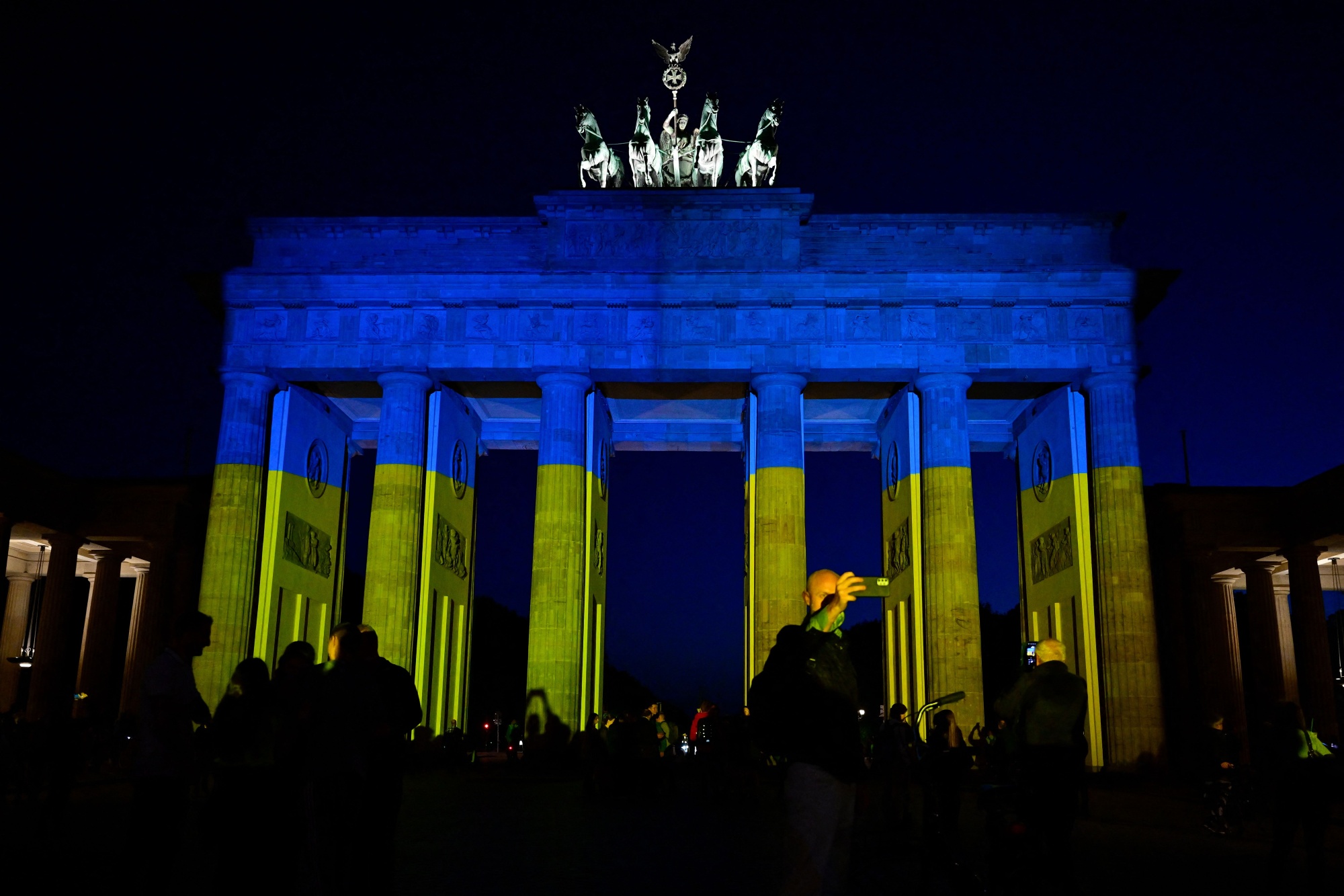 The Brandenburg Gate illuminated in the colors of the Ukrainian flag in Berlin on May 9.