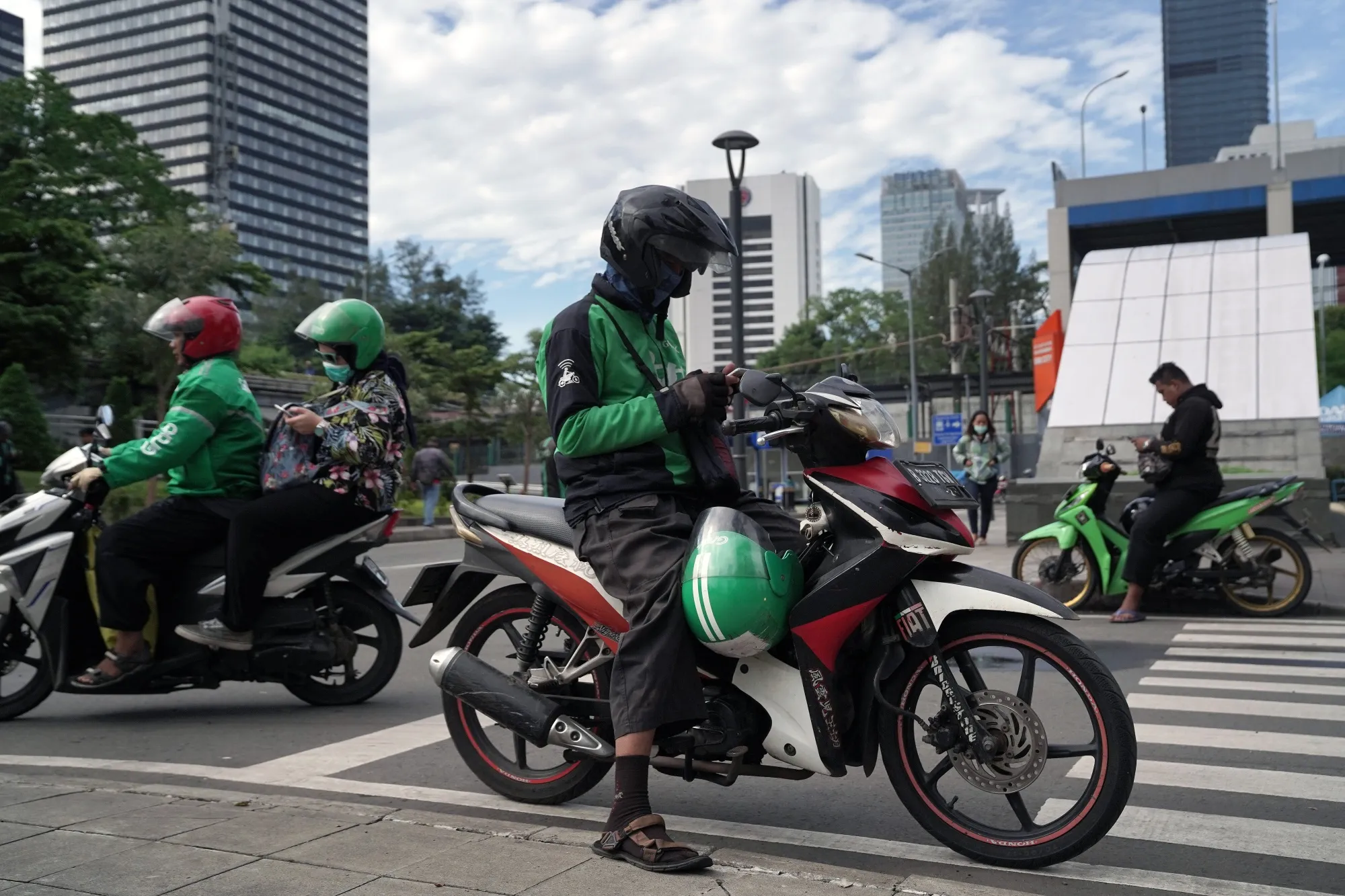 Virus Pandemic Prompts Indonesia's Government To Adopt Emergency Measures