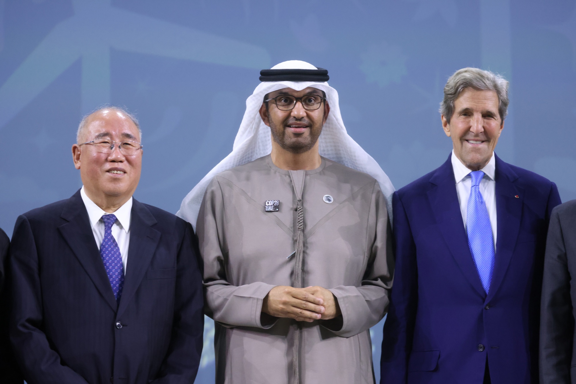 Xie Zhenhua, China's special envoy for climate change, left, Sultan Ahmed Al Jaber, president of COP28, and John Kerry, US special presidential envoy for climate.