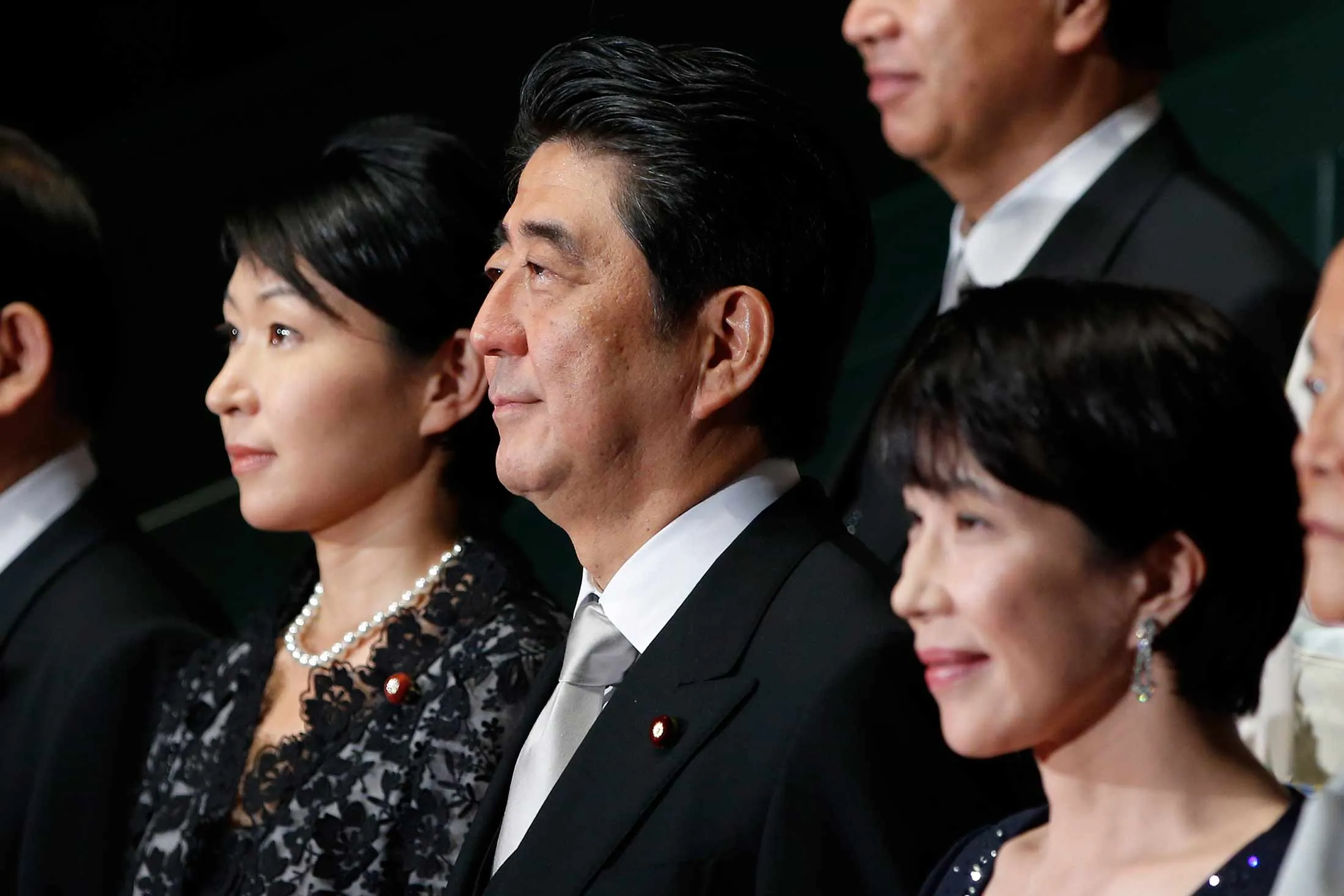 Shinzo Abe, Japan's prime minister, front row center, poses for a group photograph with members of his new cabinet
