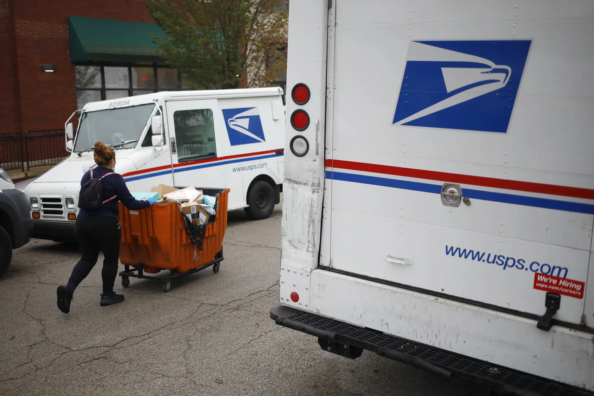 Delivery vans&nbsp;outside a United States Postal Service (USPS) distribution center in Chicago, Illinois.