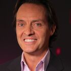Headshot of John J Legere