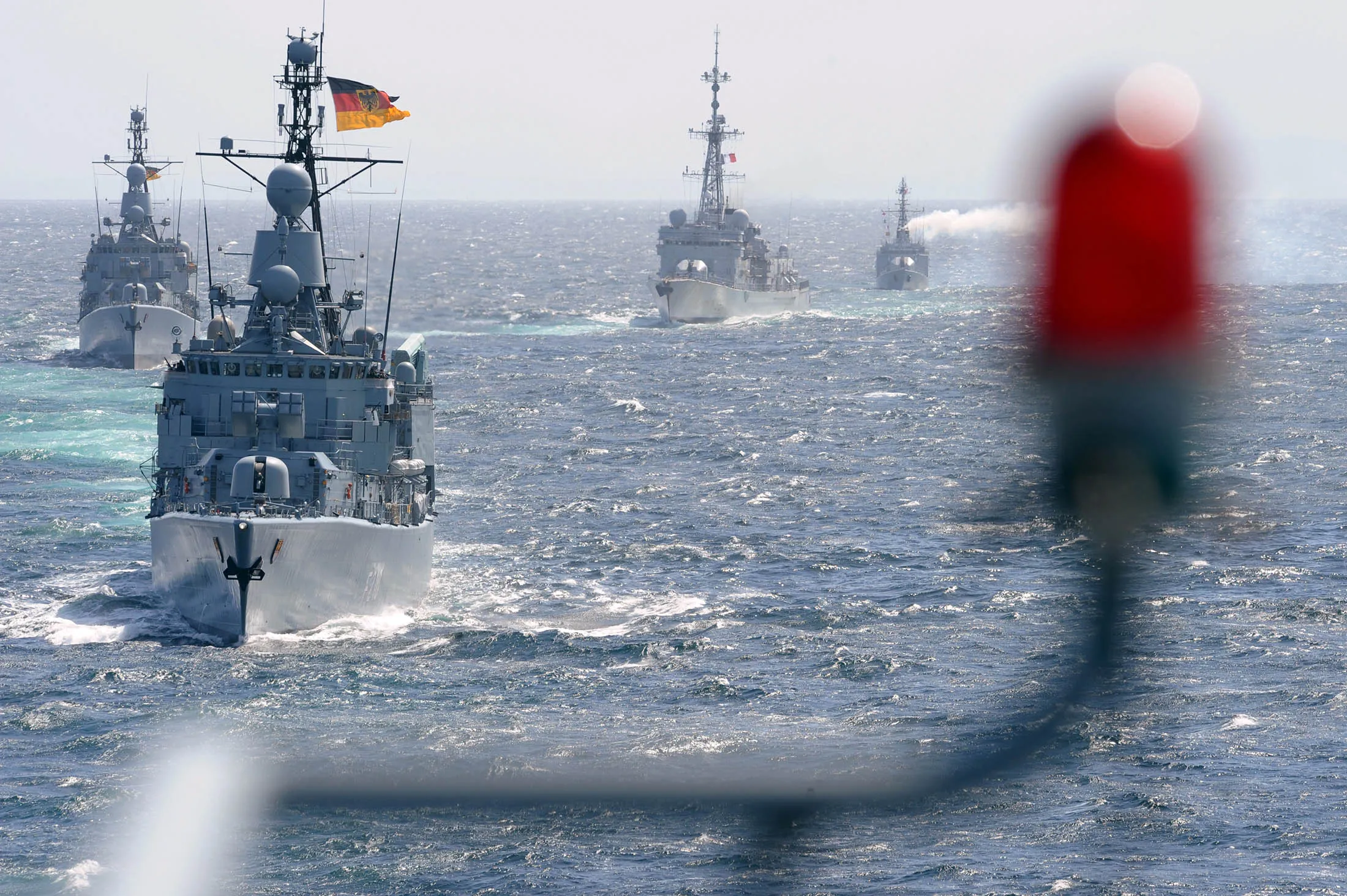 TO GO WITH AFP STORY BY SANDRA FERRER German anti-submarine frigates Emdem (2L) and Bremen (L), French anti-submarine frigates Primauget (2R) and aviso warship ''Commandant L'Herminier'' (R) patrol in the Iroise sea, off the Brittany coast, on May 23, 2013 during a multinational exercise of anti-submarine combat, called Spontex 13, of the Franco-German Naval Force (FNFA) on May 23, 2013. The training of the FNFA, created in 1991, aimed at combining French and German military capacities. AFP PHOTO FRED TANNEAU (Photo credit should read FRED TANNEAU/AFP/Getty Images)
