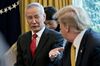 Liu He, China's vice premier, speaks as U.S. President Donald Trump, right, listens during a meeting in the Oval Office of the White House in Washington, D.C.,.