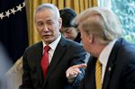 Liu He, China's vice premier, speaks as U.S. President Donald Trump, right, listens during a meeting in the Oval Office of the White House in Washington, D.C.,.