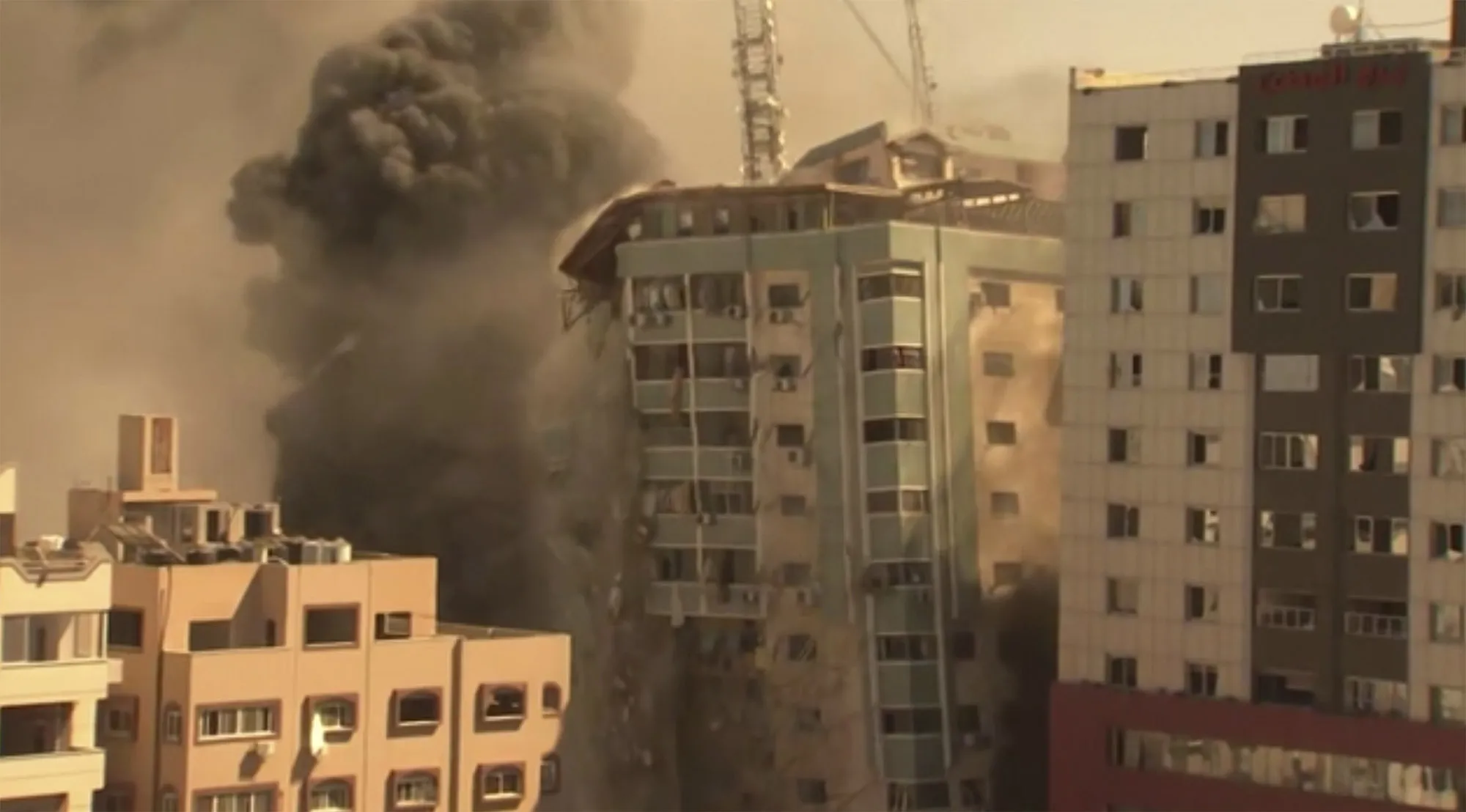 A building housing various international media, including The Associated Press, collapses after an Israeli airstrike on&nbsp;May 15.