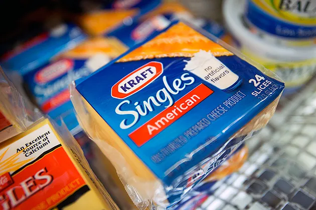 Packages of Kraft Foods Group Inc. Singles cheese slices.
