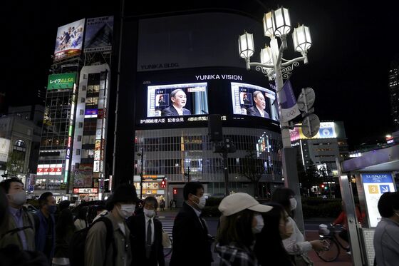 Japan’s Economy Shrinks in Emergency, Raising Double-Dip Fears