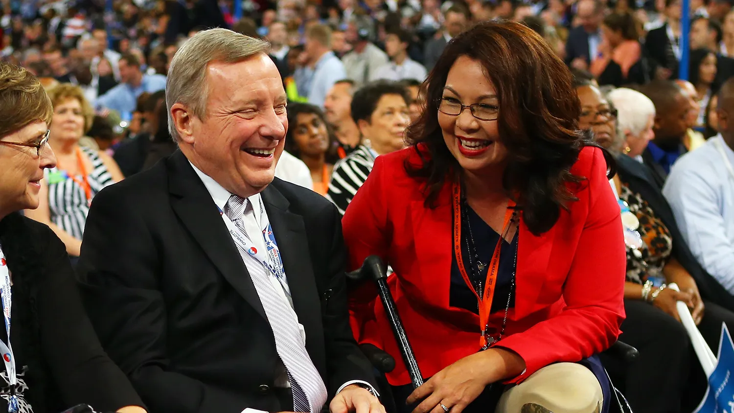 U.S. Sen. Dick Durbin (D-IL) (C) talks with Illinois nominee for Congress Tammy Duckworth (R) during day one of the Democratic National Convention at Time Warner Cable Arena on September 4, 2012 in Charlotte, North Carolina.
