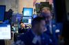 A trader works on the floor of the New York Stock Exchange (NYSE) in New York, U.S., on Monday, May 7, 2018. U.S. stocks extended gains following a spate of mergers and acquisitions while the dollar resumed its winning ways to reach the strongest level this year.
