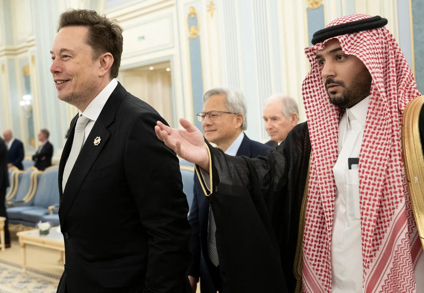 Elon Musk is directed to greet the Saudi Crown Prince at the Royal Court in Riyadh on May 13.