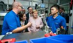 Angela Merkel during a tour of a new Webasto sunroof plant in Wuhan, 2019.