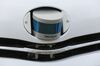 A Velodyne Lidar puck sensor sits in the bonnet of a self-driving car.