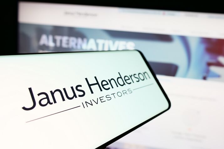 In this photo illustration, a mobile phone with the logo of