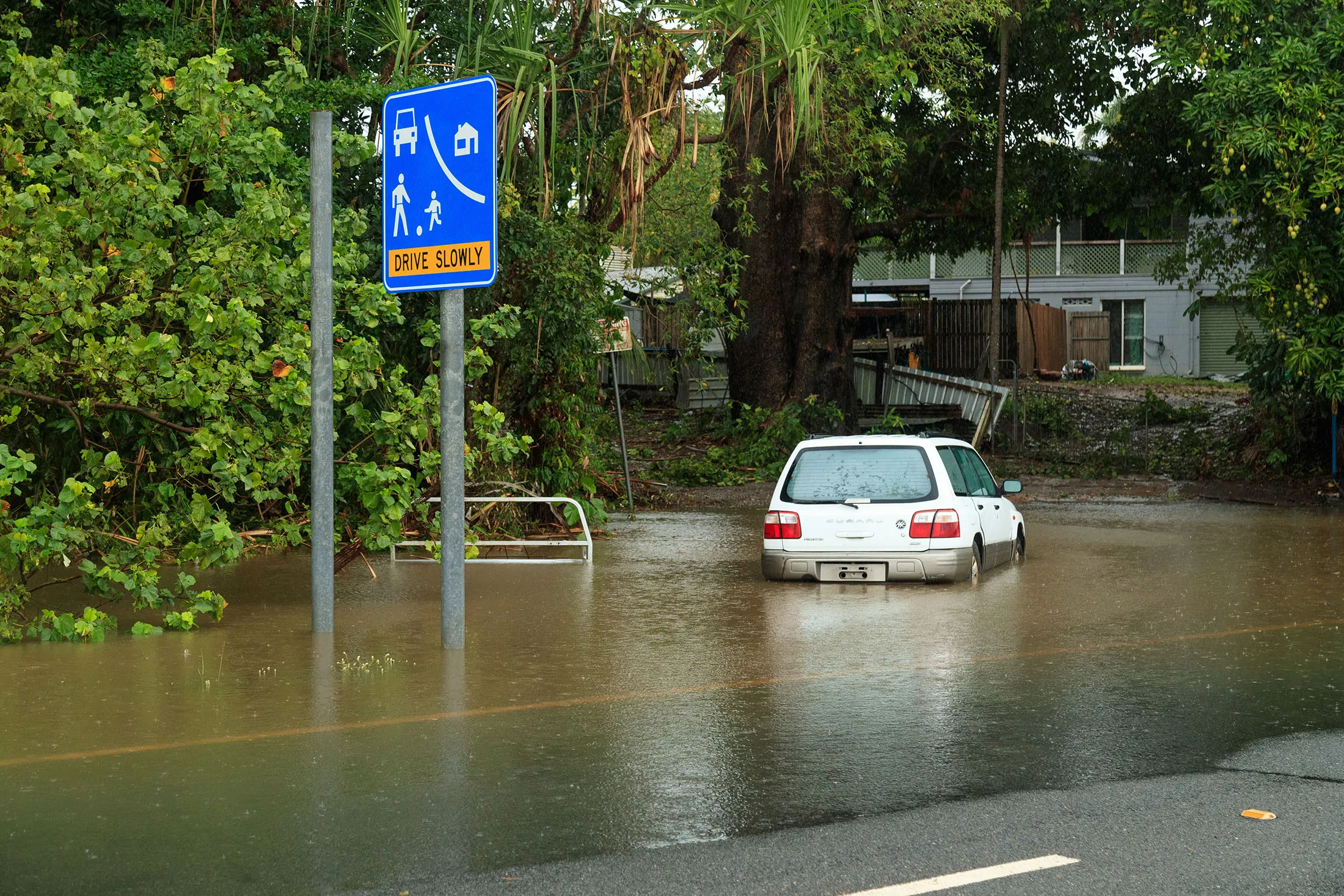 A car inundated with water after Tropical Cyclone Jasper made landfall in Cairns, Queensland, Australia, on Dec. 15.
