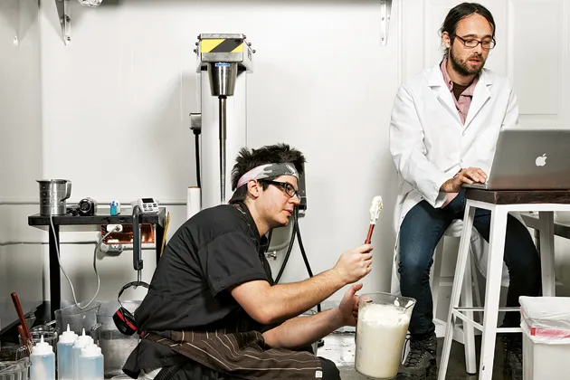 Chef Chris Jones works on eggless mayonnaise while Andy Schultze takes notes