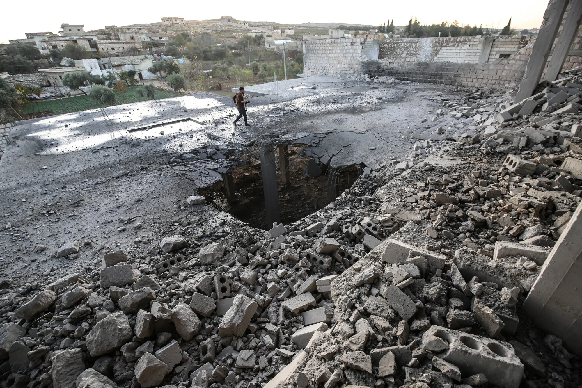 Damaged buildings following a Syrian government airstrike in Idlib on Dec. 18.