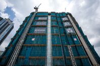 Hong Kong Developer New World Expects First Loss in 20 Years