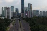 Virus Pandemic Prompts Indonesia's Government To Adopt Emergency Measures