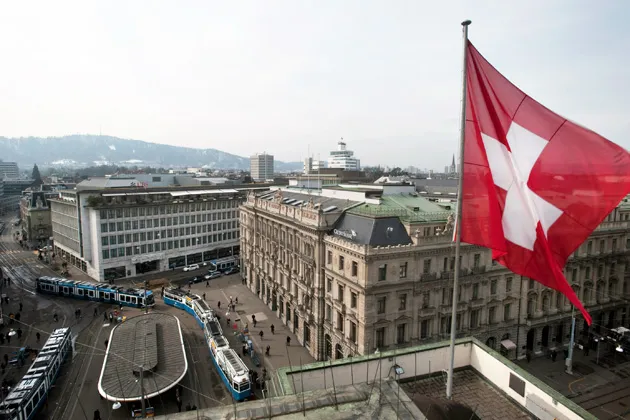 The headquarters of UBS bank, left, and Credit Suisse, far right, in Zurich, Switzerland